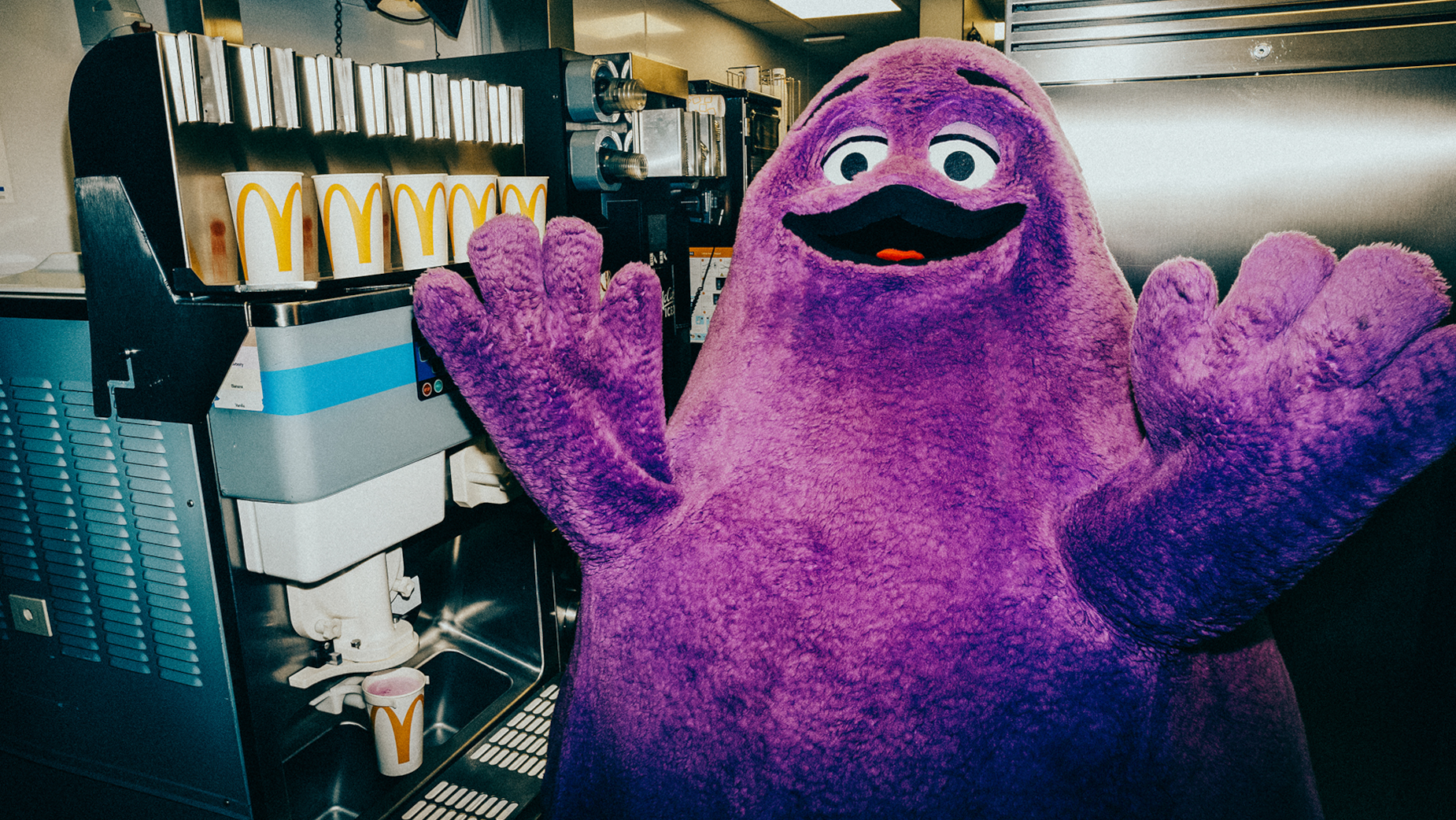 Cult figure Grimace storms McDonald’s birthday for the 50th time