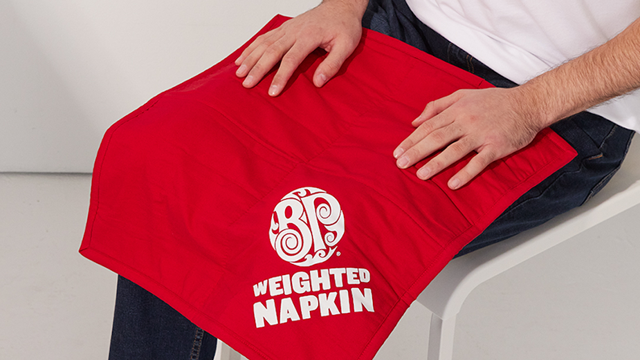 Boston Pizza Makes Mealtimes Less Stressful with the Weighted Napkin