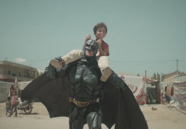 Batman Becomes Best Friends with a Young Refugee in Powerful New Film