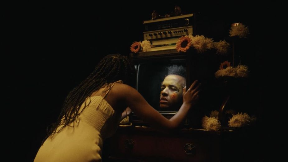 A TV Screen Views the Highs and Lows of a Relationship in Cautious Clay Music Video 'Wildfire'