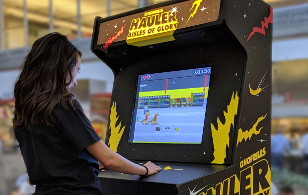 john st. Goes Retro with Arcade Cabinet and Video Game for No Frills