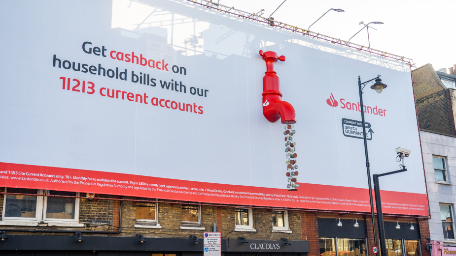 Engine Creative Unveils Massive Billboard Taps Pouring Out Coins for Santander Hackney